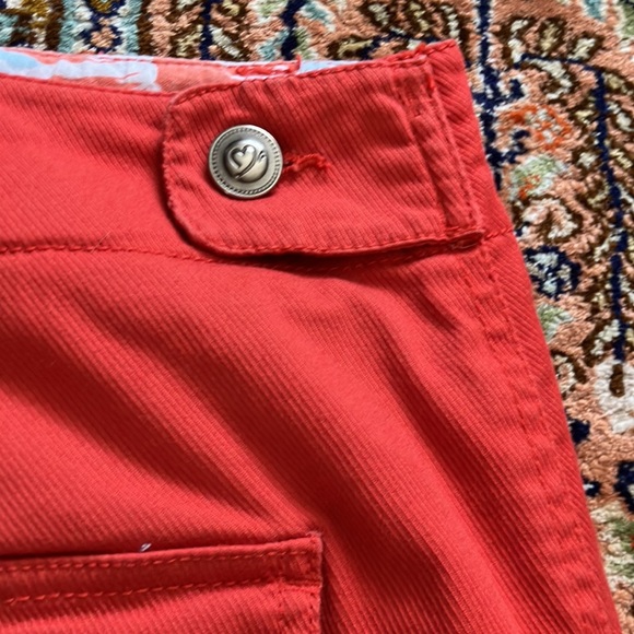 Light orange jean skirt with front and back pockets w/attached stretch shorts. - Picture 6 of 12